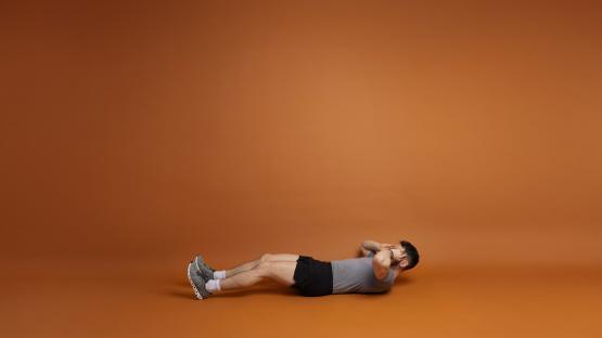 Man doing sit-ups.