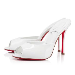 White patent leather Christian Louboutin Me Dolly mules.