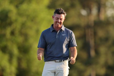 Rory McIlroy celebrating a golf victory.