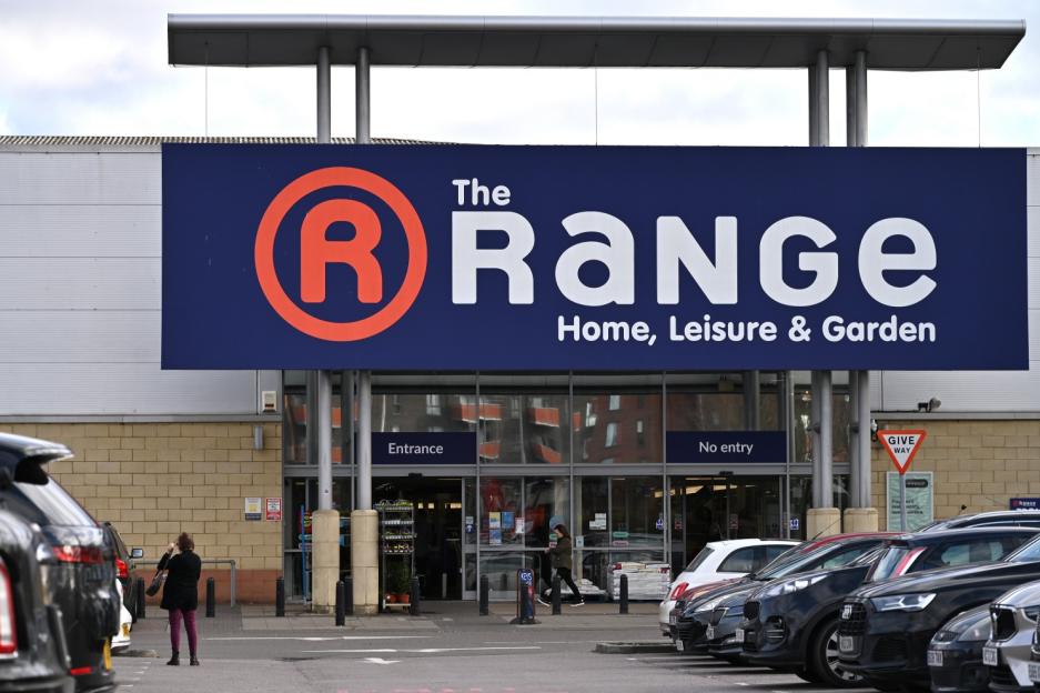 Exterior of The Range store with cars parked in front.