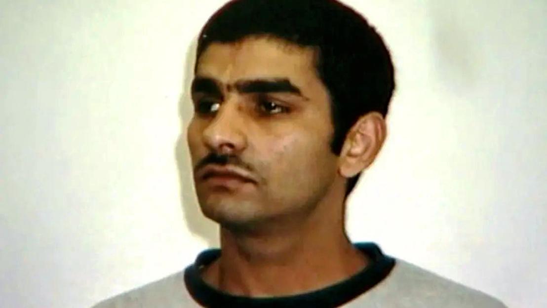 Azhar Ali Mehmood, a man with a mustache and dark hair, looks to the right.