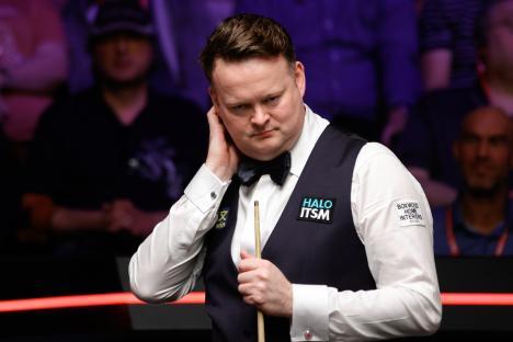 Shaun Murphy of England reacts during a snooker match.