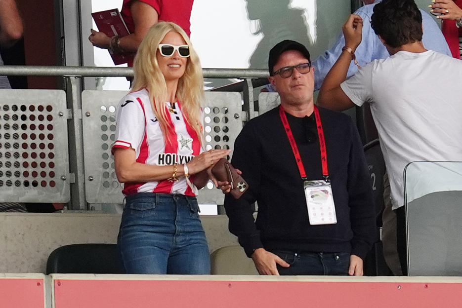 Claudia Schiffer and Matthew Vaughn watch a Premier League match.