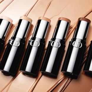 Five sticks of foundation in varying shades.