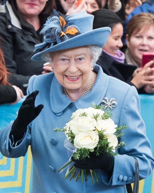 Queen Elizabeth II waving to the crowd.