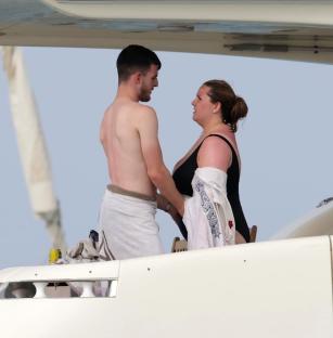 Declan Rice and his girlfriend on a yacht.