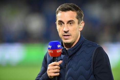 Gary Neville, Sky Sports commentator, speaking into a microphone.