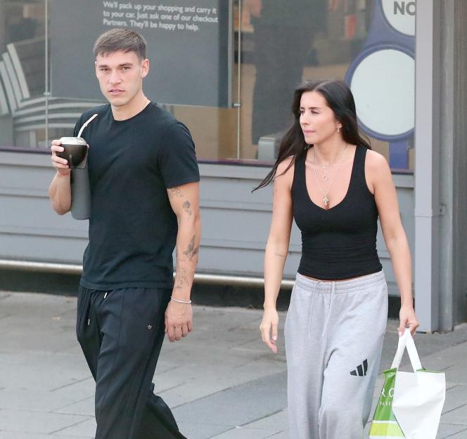 Photo of Manuel Ugarte and Georgia May Heath walking together.