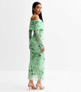 Green floral print midi dress.