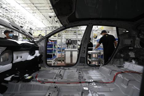 Iconic British car brand axes HUNDREDS of jobs after Trump’s tariff blitz in bid to survive ‘volatile’ times