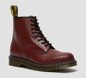 Cherry red Dr. Martens 1460 lace-up boots.
