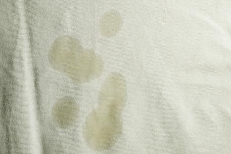 Oil stains on a white cloth.