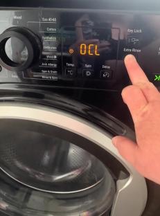 Washing machine control panel showing an