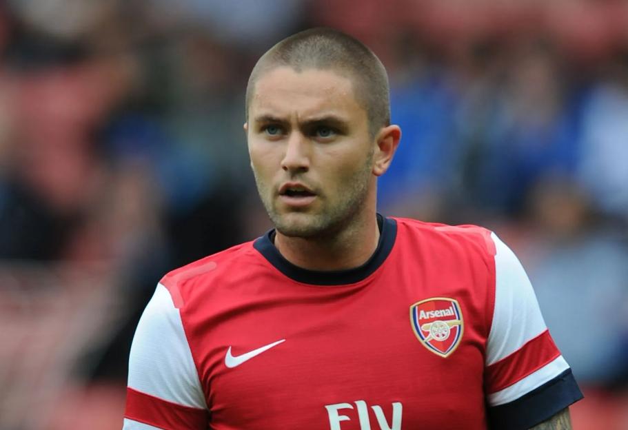 Henri Lansbury of Arsenal in action.