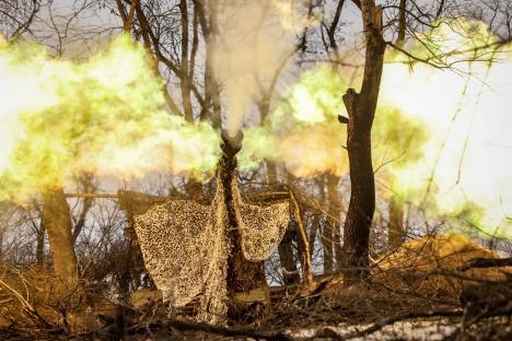 This handout photograph taken on February 28, 2025 and released on March 3, 2025 by the press service of the 24th Mechanized Brigade of Ukrainian Armed Forces, shows Ukrainian servicemen firing a M109 155mm self-propelled howitzer towards Russian positions at an undisclosed location near Chasiv Yar, Donetsk region, amid the Russian invasion of Ukraine. (Photo by Handout / 24th Mechanized Brigade of Ukrainian Armed Forces / AFP) / RESTRICTED TO EDITORIAL USE - MANDATORY CREDIT 