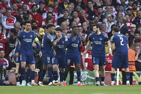 Paris Saint-Germain players celebrating a goal.