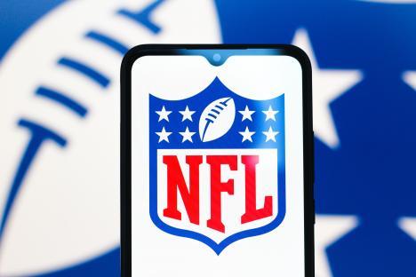 Illustration of the NFL logo on a smartphone screen.