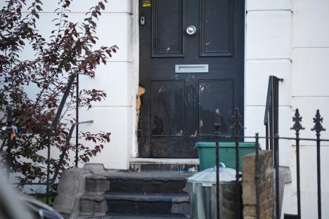 Fire damage to a front door.