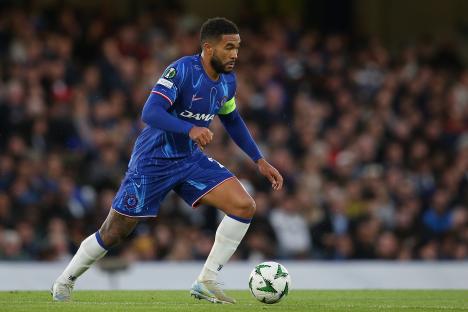 Reece James of Chelsea running with the ball during a soccer match.