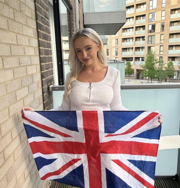 Emily Hewertson holding the Union Jack flag.