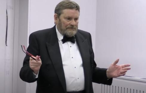Ian Liles OBE, retired Brigadier, speaking.