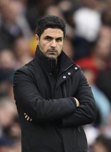 Mikel Arteta, Arsenal manager, with arms crossed.