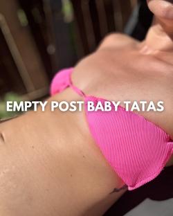 Post-baby body in a pink bikini top.