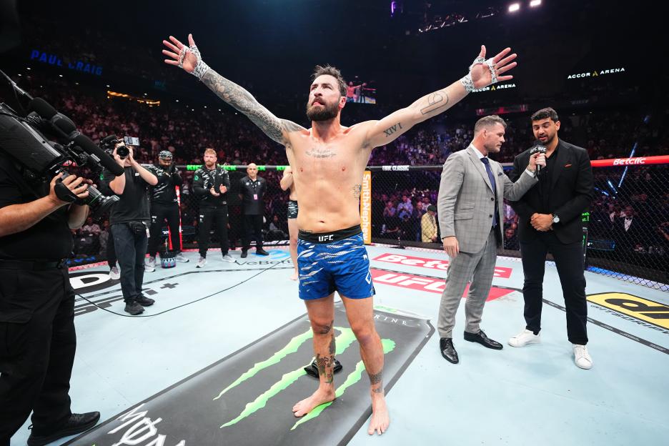 Paul Craig announcing his retirement after a UFC fight.