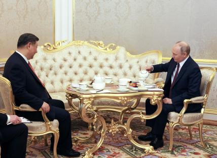 Xi Jinping and Vladimir Putin meeting in Moscow.