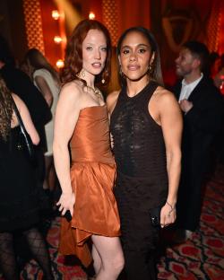Jess Glynne and Alex Scott at a Warner Music Group after-party.