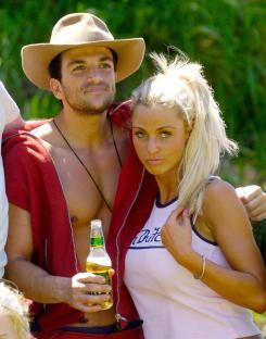 Kerry McFadden and Peter Andre celebrating after winning
