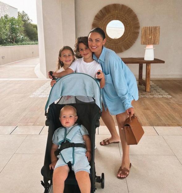 Sam Faiers with her three children and a stroller.