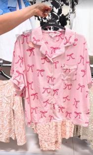 Pink pajama set with pink bows.