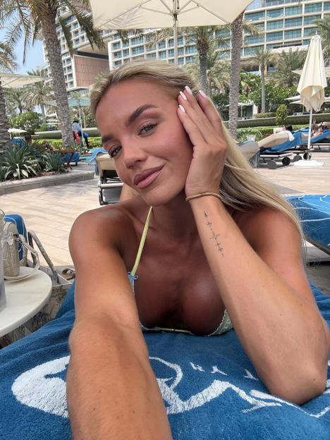 Love Island’s Molly Smith shows off incredible abs on holiday – after getting engaged to Tom Clare