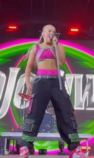 JoJo Siwa performing on stage.