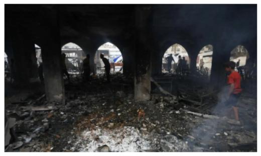 Israeli airstrike kills 26 people in Gaza, hits police station