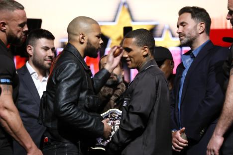 Chris Eubank Jr. striking Conor Benn with an egg at a press conference.