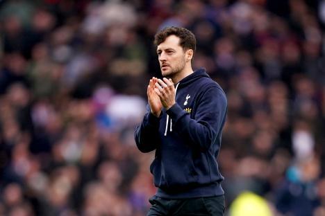 Ryan Mason, Tottenham assistant coach, applauding.