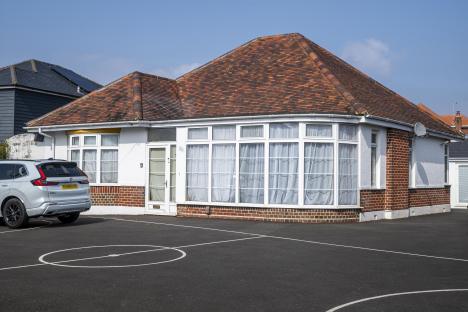 Home with pole dancing studio in converted garage.