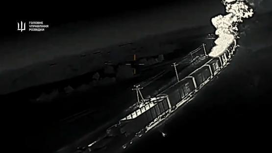 Drone footage of a burning Russian war train after a Ukrainian assault.