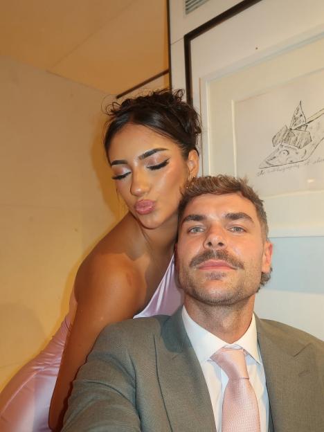 Harry Cooksley and Shakira posing together.