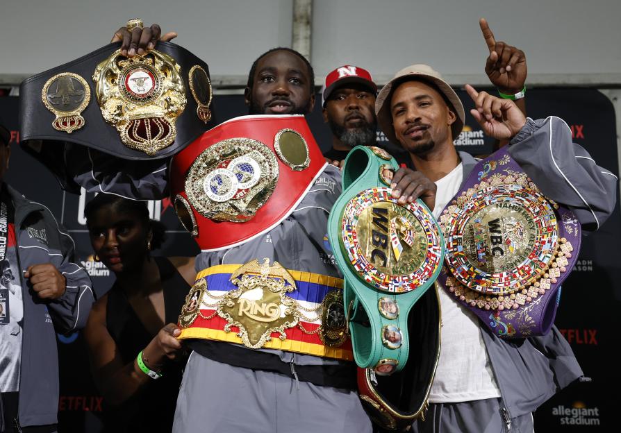 Terence Crawford with his championship belts.