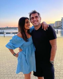 Laila Rouass and a man posing for a photo.