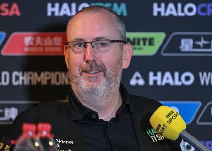 Mark Williams speaks to the media.