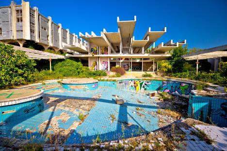 Ruins of a luxury hotel's pool area.