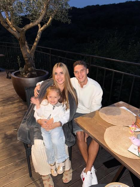 Georgiy Sudakov, his wife Liza, and their daughter.