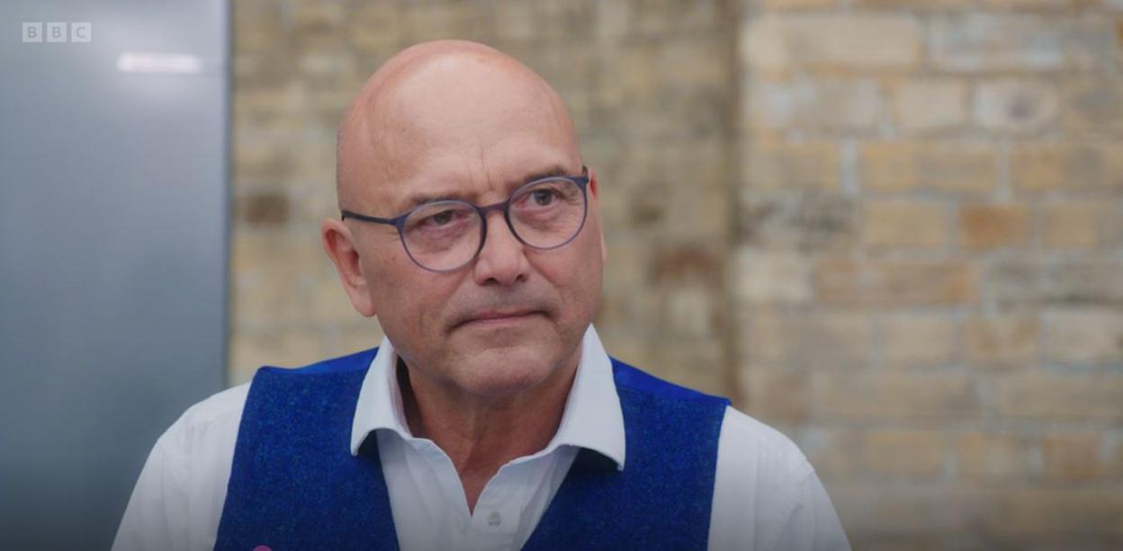 Gregg Wallace, one of the hosts of MasterChef Series 21, wearing a blue vest and glasses.