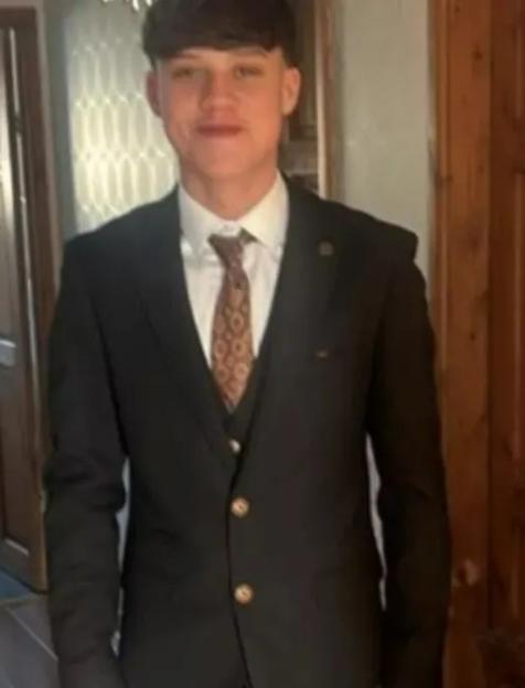 Photo of a young man in a suit.