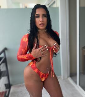 Woman in orange and red swimsuit.
