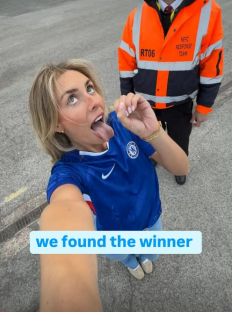 Woman in Chelsea jersey sticking out tongue; text overlay: